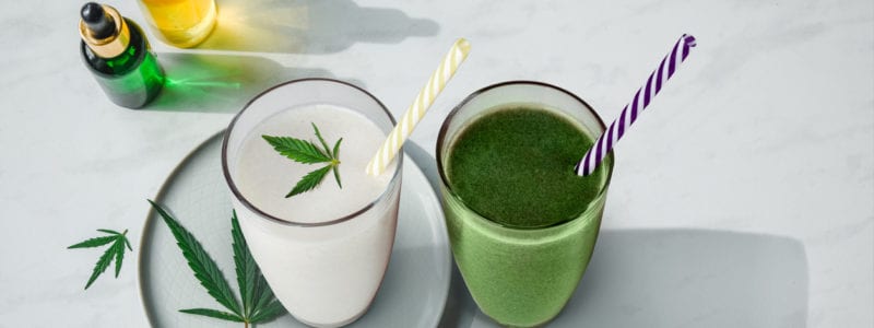 Edibles CBD and drinks with cannabis . Glasses with fresh beverage, milk and smoothies, with hemp